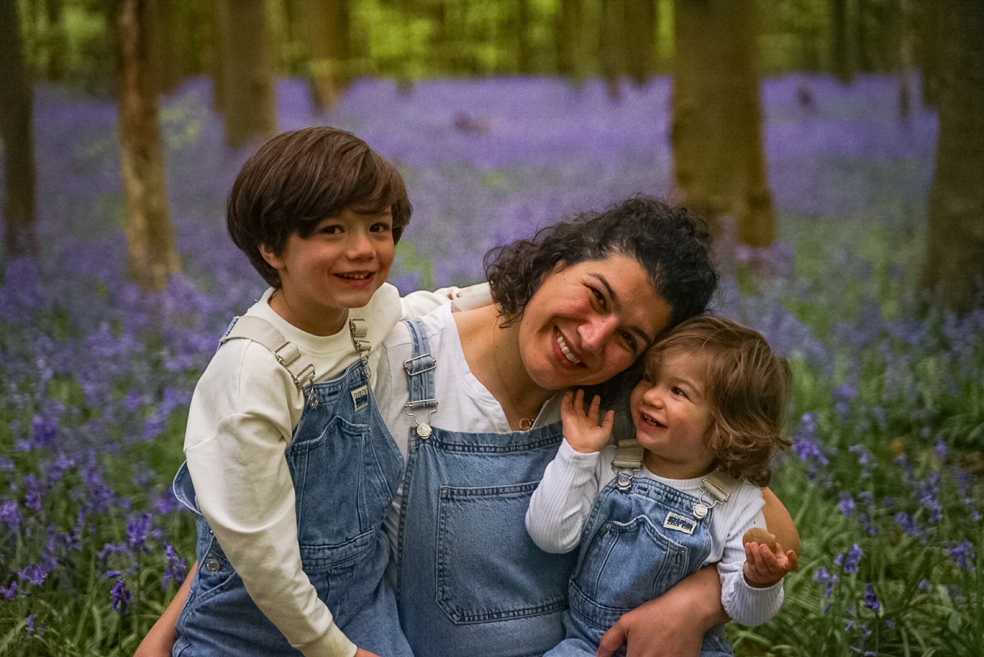 Brothers laughing together during a woodland family shoot