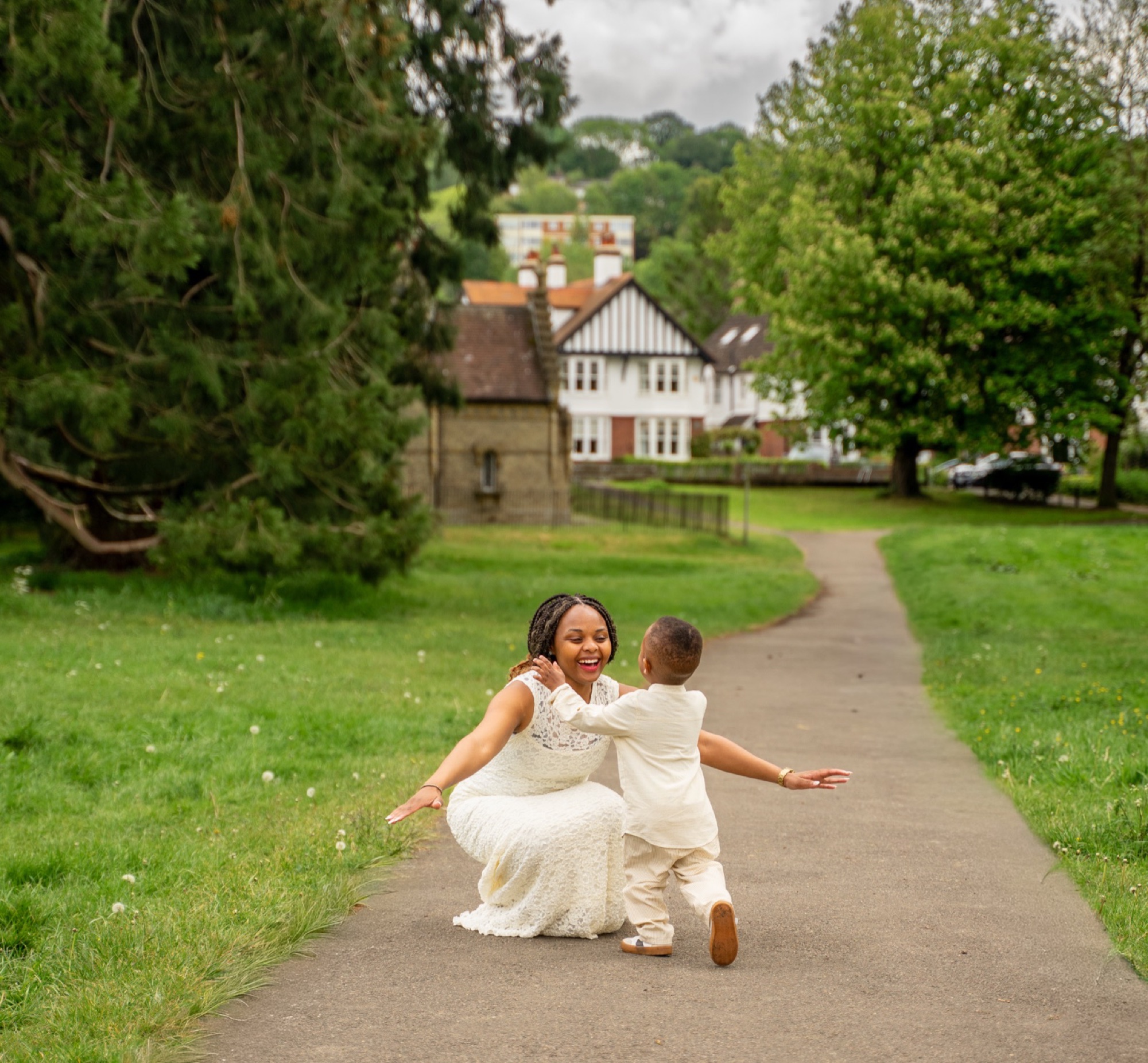 Mother and son sharing a laugh during a family session in parkland