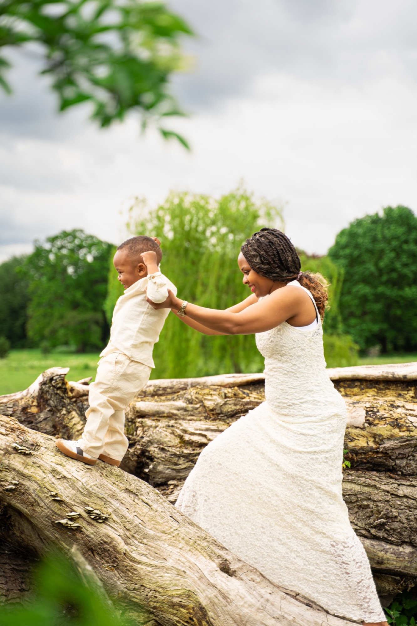 Joyful mother and son portrait in Buckinghamshire parkland