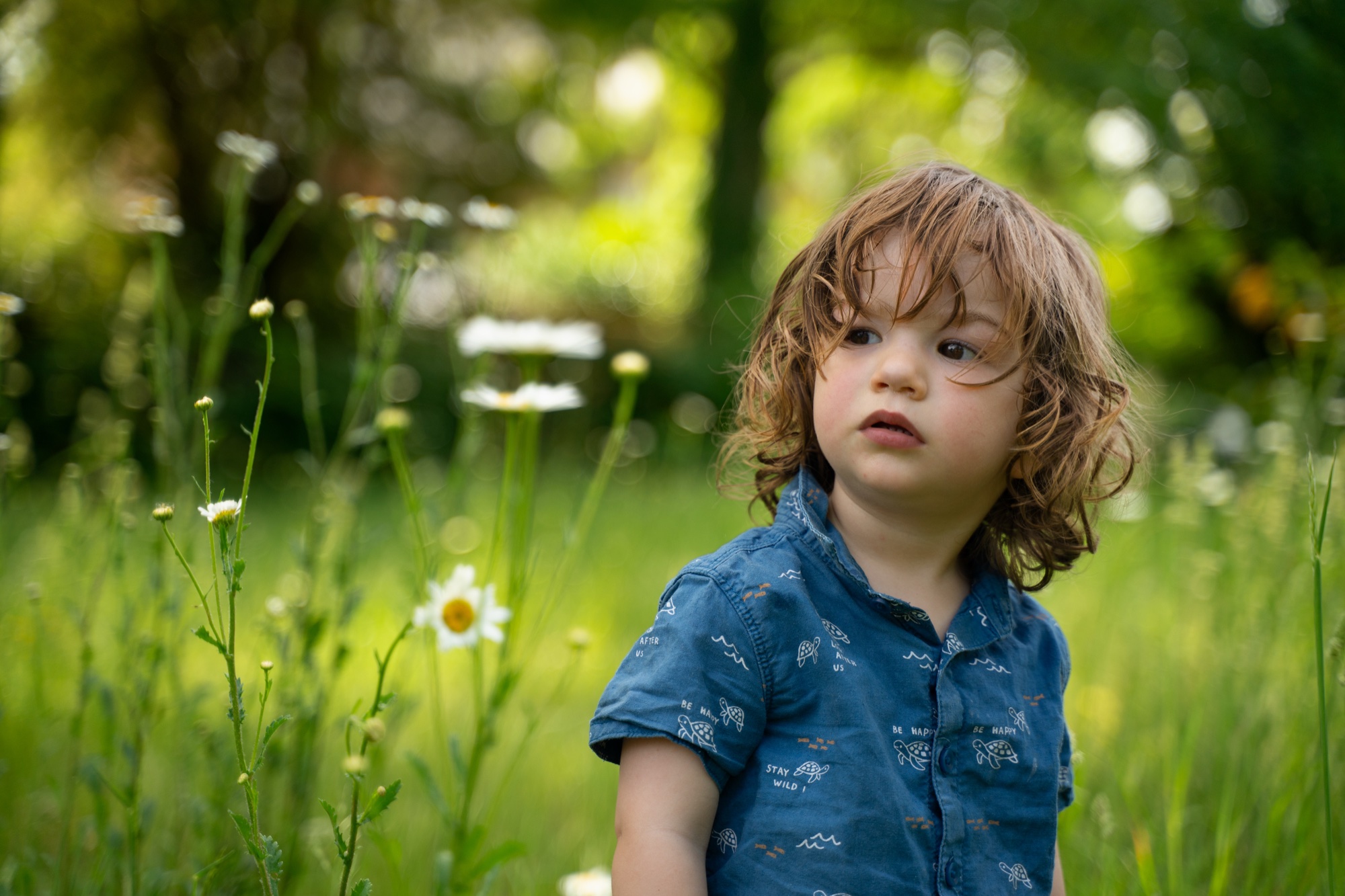 Candid portrait of a child playing outdoors in Buckinghamshire